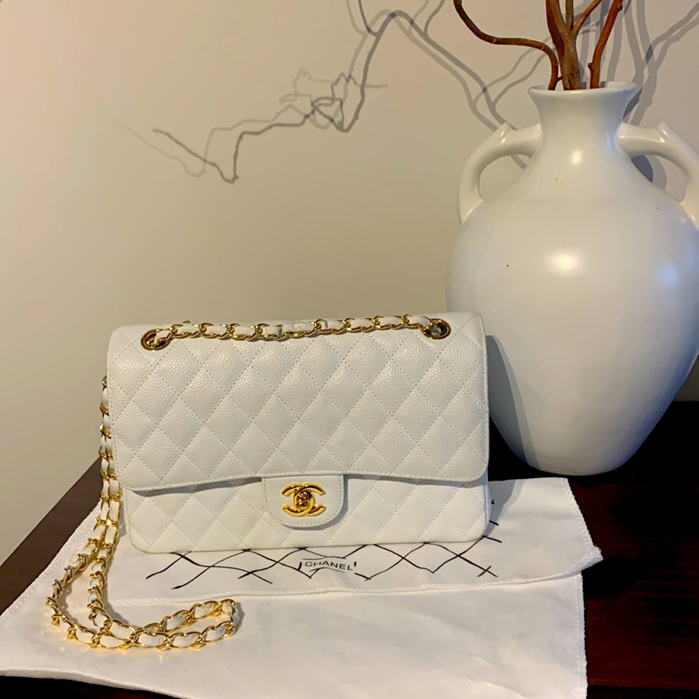 Chanel white leather bag ( gift) not sure has all stamps and all some no issues